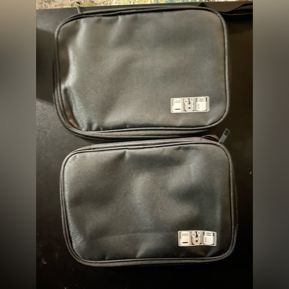 TWO CARRYING CASES FOR CHARGING CABLES